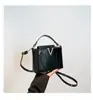 2025 Nuevo Patrón de Piedra Portátil Accesible Lujo Moda Hombro Único Retro Elegante Cruzado de Cuerpo Tendencia Bolso Cubo Pequeño para Mujer