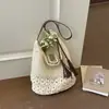 Bolsa de Playa para Vacaciones para Mujer Verano Paja Tejida Bolso de Hombro Único Gran Capacidad Bolso Cubo con Borlas Viaje Bolso de Axila Estilo Versátil