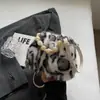 Bolso Retro Peludo Transfronterizo para Mujer 2026 Otoño e Invierno Nuevo Bolso de Mano Moda Bolso Cruzado de Felpa Bolso Cubo Estampado de Leopardo