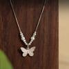 Nuevo collar de mariposa de perlas plata rota para niñas lujo ligero nicho cuentas de transferencia plata S925 cadena clavícula joyería al por mayor