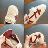 2025 primavera nuevos zapatos para niños al por mayor zapatos deportivos de suela blanda de cuero para niños zapatos coreanos Forrest Gump zapatos blancos