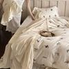 Juego de cama de cuatro piezas de algodón lavado con bordado de niña retro francesa, diseño de nicho de algodón, falda de cama romántica, funda de edredón