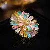 Broche de girasol dopamina de lujo ligero de nicho, piedra colorida brillante de alta gama, elegante broche de flor arcoíris de alta gama para mujer