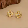Pendientes de trébol de cuatro hojas para mujer, pintados con esmalte, retro, nuevo estilo chino, nueva colección 2026, elegantes, de lujo ligero, pendientes versátiles
