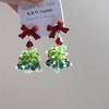 Pendientes navideños con lazo y árbol de Navidad 2025, bonitos y femeninos.