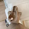 Bolsa de Balde Portátil Estilo Retrô Francês para Mulheres 2026 Inverno Novo Estilo Roupa Diária de Trabalho Bolsa de Ombro Nicho Casual Bolsa Transversal
