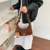 Bolso de mano nube elegante de alta gama para mujer 2026 nuevo bolso de hombro único con cadena exquisita bolso cruzado de nicho coreano