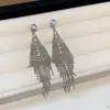 Modernos y Minimalistas Brazaletes para Oreja Retorcidos de Piedra Ojo de Tigre para Mujer, Pendientes Versátiles Vintage, Accesorios para Orejas de Otoño e Invierno con un Toque de Lujo Ligero y de Alta Gama