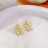 Estilo Pétalo Ins Pendientes Populares de Comercio Electrónico Transfronterizo Retro Oro de 18K Acero de Titanio Texturizado Pendientes de Pétalo Joyería para Mujer