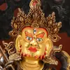 Nepal Hecho a Mano Semi-dorado Tesoro Rey Celestial Buda Estatuas Tíbet Adornos para el Hogar Estatuas de Buda Adornos 10 Pulgadas