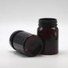 Botella PET de 80 ml de plástico de boca ancha color marrón oscuro para embalaje sólido de grado alimenticio