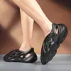 Comércio exterior 2022 verão novo coco Baotou buraco sapatos masculino e feminino Tamanho grande Praia eva casal sandálias atacado