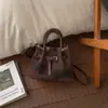 Bolsa Exclusiva de Nicho de Ombro Único para Mulheres 2026 Nova Vintage Versátil Bolsa Mãe-Filha Bolsa Transversal Bolsa de Mão Fashion Bolsa Saco