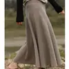 Falda beige falda de paraguas drapeado de alta gama falda grande falda por encima de la rodilla alta otoño e invierno falda de lana longitud media