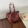 Bolso tote de gran capacidad estilo coreano para mujer, nuevo modelo 2026, bolso de cubo para hombro casual para el trabajo, bolso de moda casual moderno