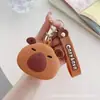 Bolsa de monedas popular de Capibara Llavero Cabeza de silicona Bolsa de almacenamiento para auriculares Bolso colgante Accesorios Regalos pequeños Al por mayor