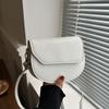 Textura simples cor sólida semicírculo 2024 nova moda ocidental textura casual ombro crossbody bolsa de selim para mulheres