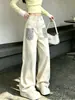 Pantalones de pierna ancha de retazos con estampado de leopardo de moda para mujer, con diseño de remaches, estilo callejero, corte holgado, versátiles pantalones largos de mezclilla
