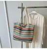 Bolsa tejida de rayas coloridas, bolsa de paja estilo vacacional, bolso de hombro versátil de alta costura, bolso nuevo de gran capacidad