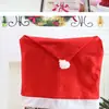 Em estoque, vendendo muito, capas de cadeira de Natal em TNT vermelho, decorações de mesa de Natal, chapéus de Natal, toalhas de mesa e capas de cadeira