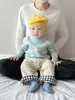 Ropa de punto linda para niños Otoño e Invierno Traje de punto azul blanco Moda para niño pequeño Cálido Empalme Pantalones rectos