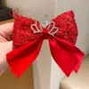 Horquilla con lazo rojo para el pelo, accesorio para el pelo para niña, bonito accesorio para el pelo para celebrar el Año Nuevo.
