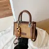 Elegante y moderno bolso pequeño cuadrado con estampado de leopardo, nuevo modelo de principios de otoño 2026, bolso de mano simple y moderno para el trabajo y los desplazamientos