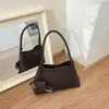 Comercio exterior, bolso de axila tejido ligero de lujo para mujer, estilo retro de otoño, versátil para ir al trabajo, con un aspecto sofisticado y elegante, bolso de hombro o bolso de mano