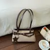 Bolsa grande de alta capacidade, única e simples, bolsa de ombro casual da moda e moderna, nova bolsa tote feminina da primavera de 2026