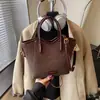 Bolsa Pequena de Mão Simples Transfronteiriça Feminina de Nicho Bolsa Saco Transversal Moda Outono 2025 Versátil Bolsa para o Dia a Dia