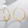 Pendientes de aro ovalados minimalistas con un estilo francés, relajado, vintage, de alta gama, pendientes chapados en oro de 18 quilates de nicho europeo y americano