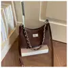 Bolso de axila de moda para mujer 2026 Nuevo modelo de gama alta versátil para el trabajo diario bolso de hombro bolso cruzado casual simple con cadena