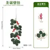 Colgante de pared de acebo artificial navideño transfronterizo, con hojas de acebo verde oscuro y bayas rojas, para decoración de pared interior y arreglos florales festivos