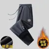 Pantalones deportivos casuales de pana gruesos con forro polar para otoño e invierno para hombre, pantalones deportivos de marca de moda Harlan de pierna suelta para invierno