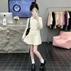 Conjunto de Punto de Dos Piezas Estilo Preppy Coreano Nuevo para Niñas Primavera/Otoño 2026, con una Falda Plisada Elegante y Dulce