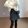 Falda Corta Suave y Amigable con la Piel de Línea A Anti-Exposición Botón Cintura Alta Falda de Lana Línea A Media Falda para Mujer 26 Invierno H100509