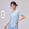 Top de yoga moderno de torsión irregular para mujer, prenda deportiva exterior holgada de manga corta, top de diseño casual ligero