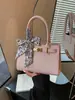 Bolso de Mano con Patrón de Cocodrilo 2026 Primavera Nuevo Nicho de Alto Valor Bolso de Hombro Cruzado Gran Capacidad Bolso Cuadrado Pequeño Simple