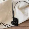 Estilo ins coreano cadena de suéter de cuerda negra larga extraíble con forma de corazón, collar con colgante de corazón simple, versátil, sensación de alta gama, para mujer
