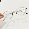 Gafas cat-eye cuadradas-redondas de titanio ultraligeras, ovaladas azules lisas bloqueadoras de luz azul, alambre dorado y plateado, se pueden adaptar con lentes recetados, montura de gafas Danyang para hombre