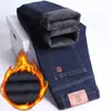 Jeans grosso forrado com fleece masculino calça reta solta 2023 novo algodão elástico para meia-idade outono e inverno quente transfronteiriço