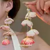Brincos de Flor de Tecido com Franja e Pérolas para Mulheres Novos Super Fada Doce Gancho de Orelha Moda Versátil Acessórios de Orelha Nicho Sensação de Alto Padrão