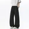 Pantalones anchos retro de estilo americano, fluidos, sencillos y casuales para hombre, perfectos para otoño, con un corte holgado y relajado, versátiles y fáciles de combinar, y un diseño de pierna recta
