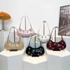 Bolso de mujer de moda con personalidad y remaches de tendencia europea y americana 2025, nuevo bolso de mano coreano para axilas, bolso de hombro de moda