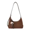 Bolso de moda trendy para mujer 2026 nuevo modelo bolso de hombro gran capacidad versátil bolso de mano para el día a día bolso tote bolso pequeño para debajo del brazo