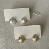 Pendientes Metálicos de Zirconia Estilo Ráfaga de Estrella Cepillados Tipo Frijol de Lujo Ligero y de Gama Alta para Mujer Moda Elegante de Nicho Pendientes de Moda