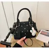 Bolso Cruzado de Mano al Hombro para Mujer Transfronterizo de Moda 2026 Flor Nuevo Estilo Casual Versión Coreana Tipo Almohada Gran Capacidad