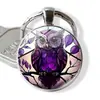 Llavero colgante de búho de temu de alta venta transfronteriza accesorios de nuevos productos transfronterizos anillo de flor de metal repujado llavero regalo