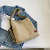 Bolsa de Lona para Mujer, Gran Capacidad, Nuevo Modelo 2026, Bolso de Hombro Cruzado Texturizado Otoño e Invierno, Bolso Tote para Viajes Transfronterizos