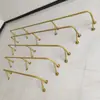 Perchero de pared lateral fijo, barra de ropa de pared, soporte simple de acero inoxidable para interiores, perchero